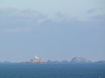 SX00923 Lighthouse on rocks at Welsh coast.jpg
